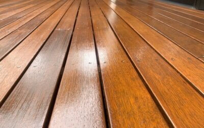 How do I know if my deck is dry enough to stain?